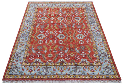 Traditional Turkish Design Rust And Blue Hand Knotted Wool Rug.