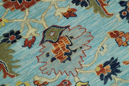 Traditional Turkish Knot Fine Blue And Rust Hand knotted Wool Area Rug.