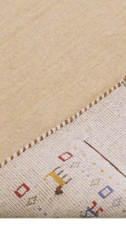 Tribal Border Ivory Design Hand Loomed Wool Area Rug.