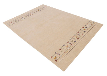 Tribal Border Ivory Design Hand Loomed Wool Area Rug.