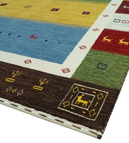 Tribal Gabbeh Green, Gold, Blue, Maroon and Ivory Stripes design Traditional Wool Area Rug.