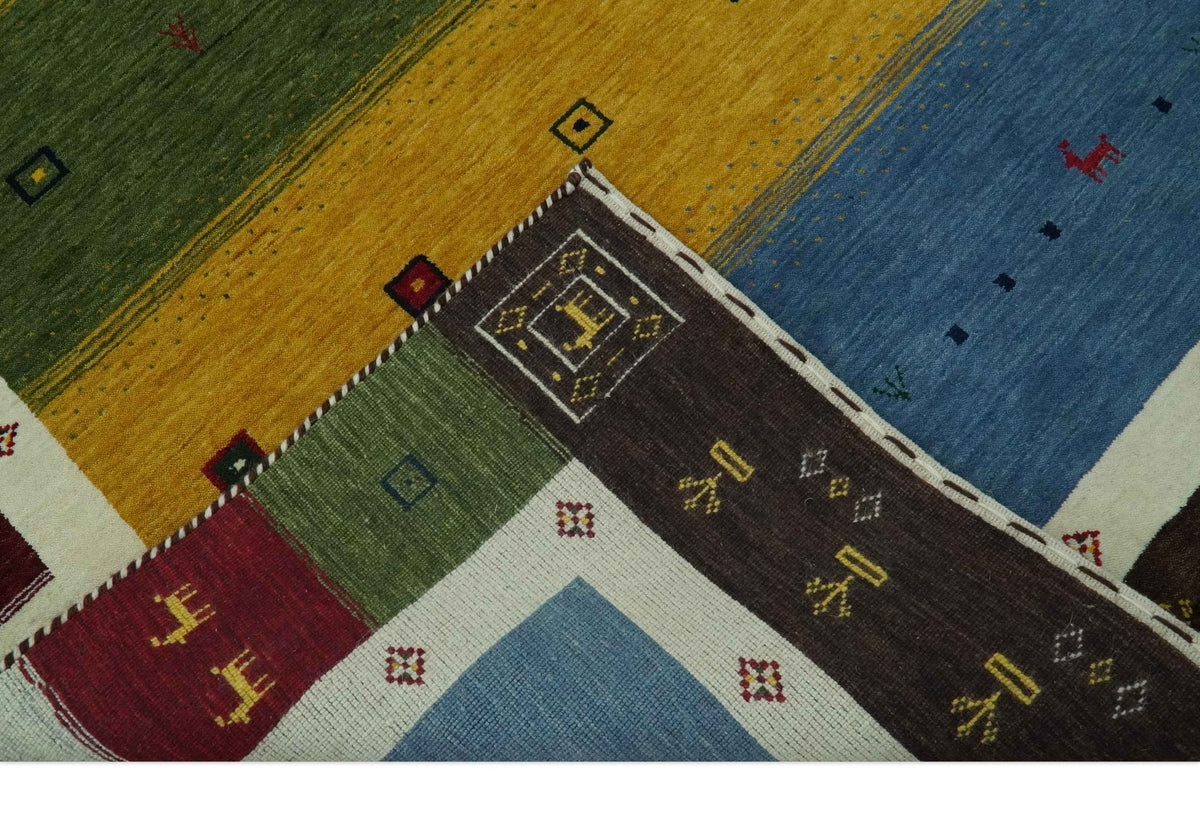 Tribal Gabbeh Green, Gold, Blue, Maroon and Ivory Stripes design Traditional Wool Area Rug.