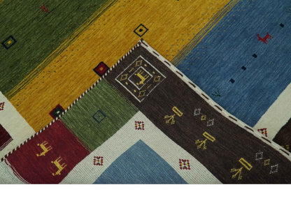 Tribal Gabbeh Green, Gold, Blue, Maroon and Ivory Stripes design Traditional Wool Area Rug.