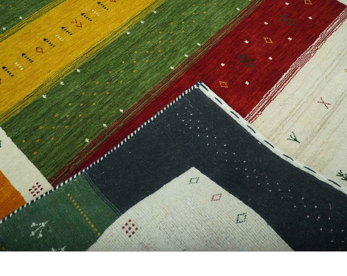 Tribal Gabbeh Green, Gold, Ivory, Maroon and Black Stripes design Traditional Hand loom Wool Area Rug.