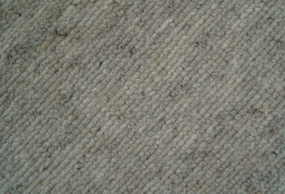 Tulu Modern Solid Beige Hand Knotted Wool Area Rug.