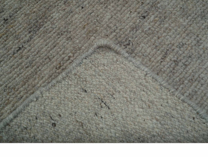 Tulu Modern Solid Beige Hand Knotted Wool Area Rug.