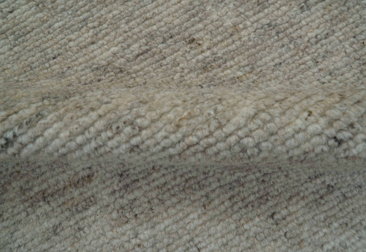 Tulu Modern Solid Beige Hand Knotted Wool Area Rug.
