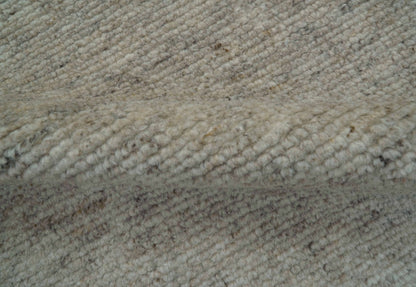 Tulu Modern Solid Beige Hand Knotted Wool Area Rug.