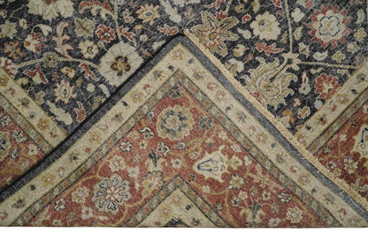 Hand Knotted Traditional Black, Rust and Beige Textured Low Pile Distressed Wool Rug.
