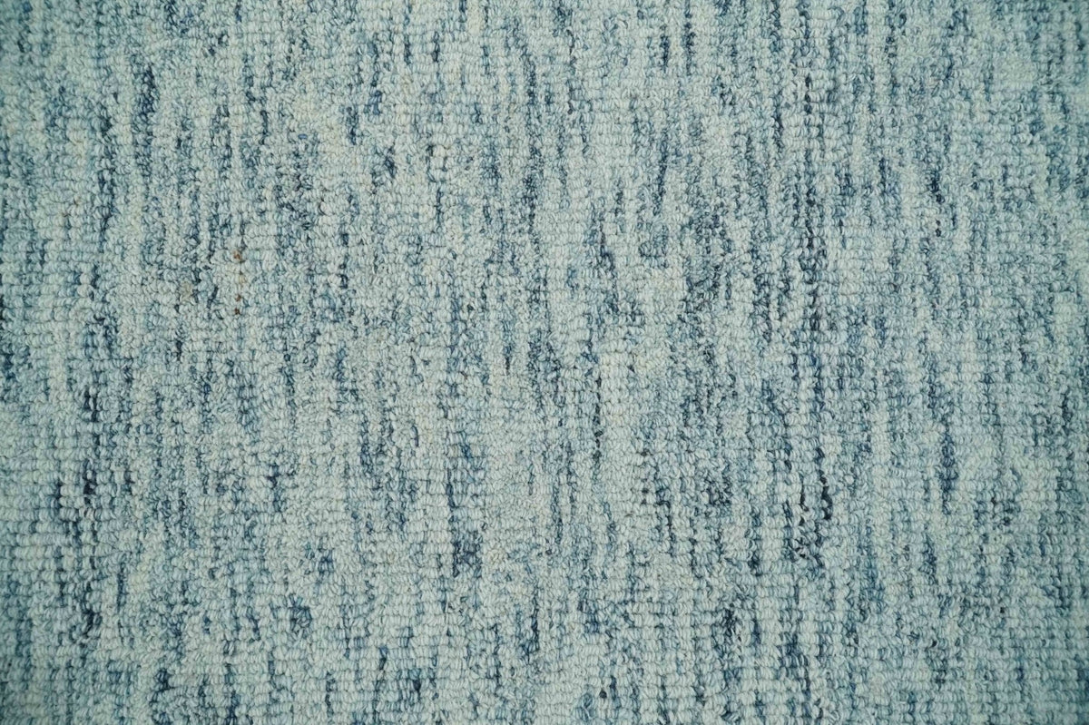 Custom Made Ivory and Blue Abstract Hand Tufted Wool Area Rug.