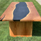 The Carpentry Shop Co., LLC Cherry and Black Epoxy River Dining Table with Live Edge Table Legs