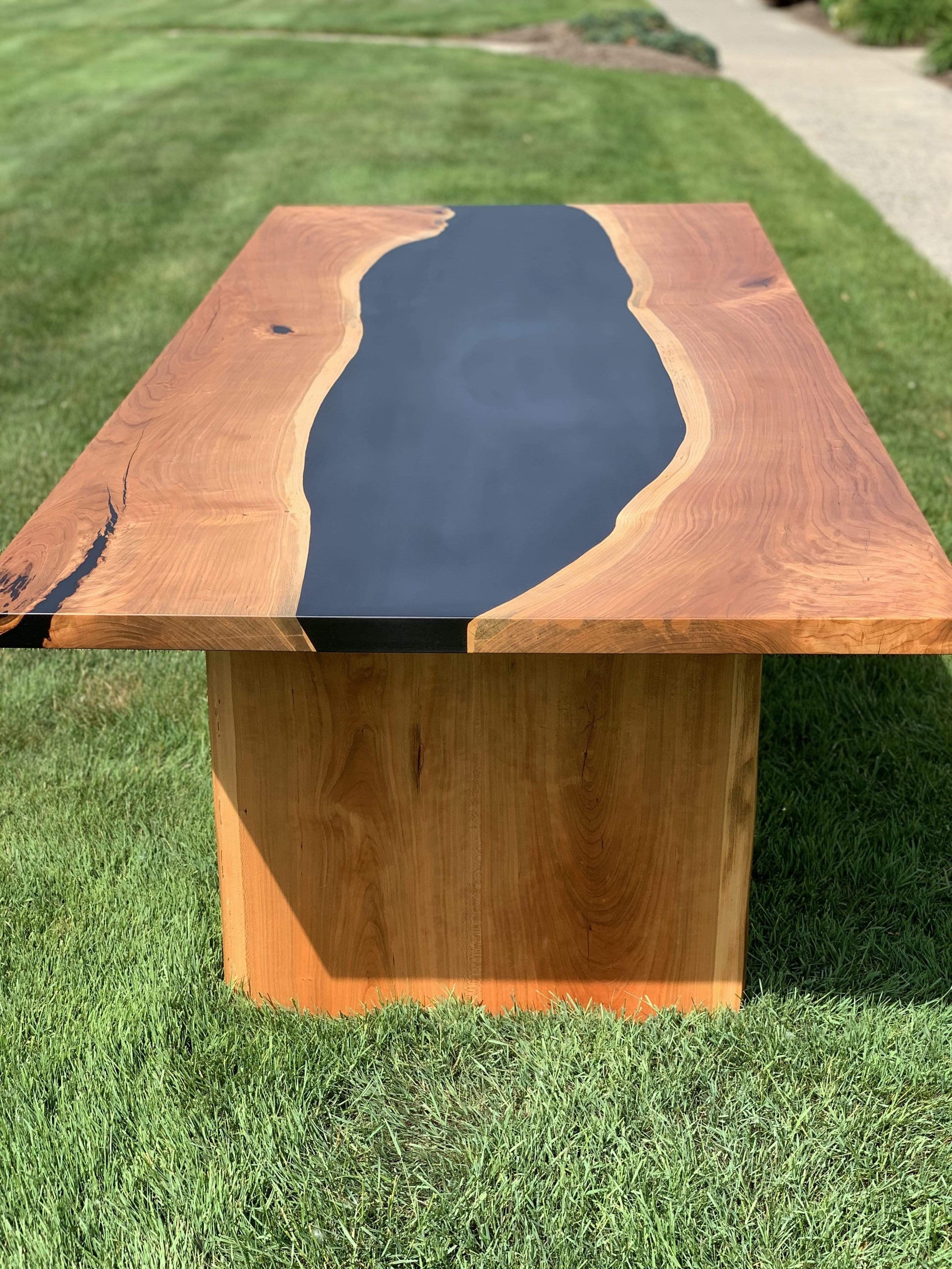 The Carpentry Shop Co., LLC Cherry and Black Epoxy River Dining Table with Live Edge Table Legs