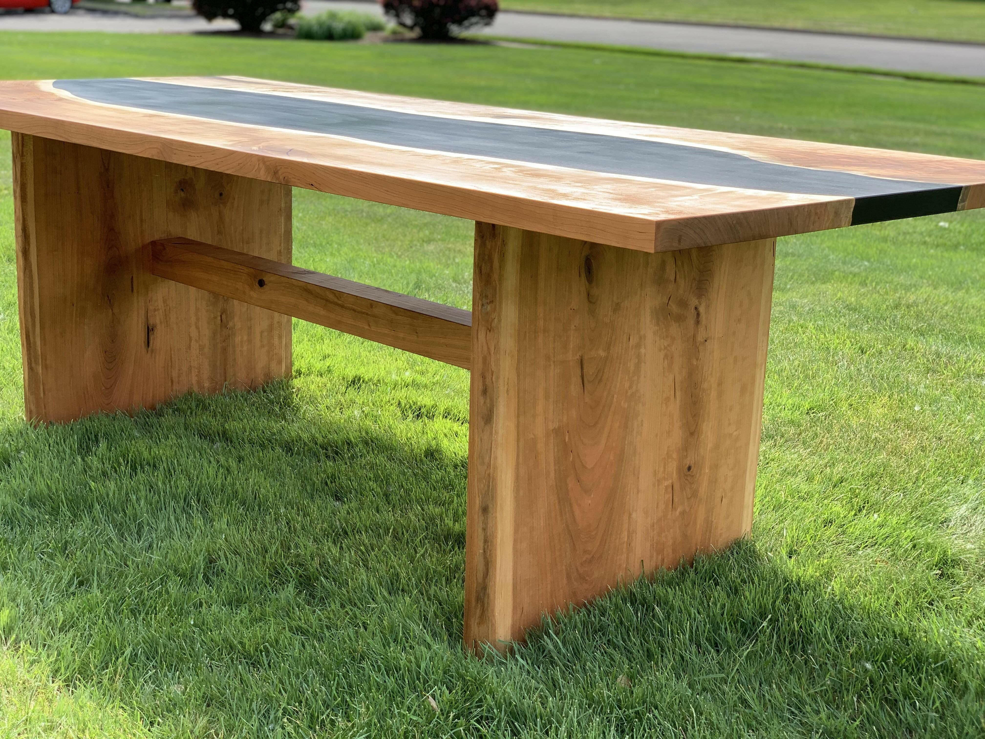Modern Style Epoxy River Table Featuring Cherry Wood and Live Edge